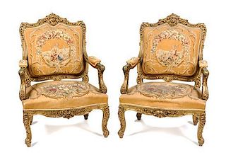* A Pair of Louis XV Style Giltwood Fauteuils Height 44 inches.