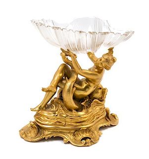 A French Gilt Bronze and Cut Glass Figural Centerpiece Height of base 11 inches.