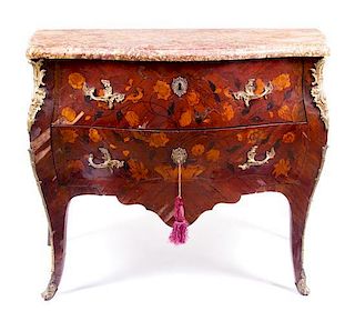 A Louis XV Style Gilt Bronze Mounted Marquetry Commode Height 35 1/4 x width 44 1/2 x depth 25 3/4 inches.