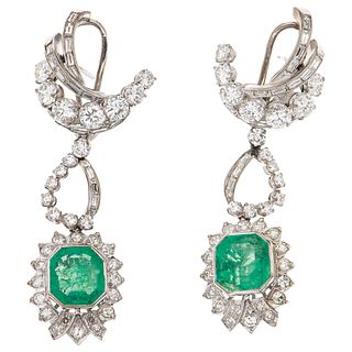 PAIR OF EARRINGS WITH EMERALDS AND DIAMONDS IN PALLADIUM SILVER with 2 octagonal cut emeralds ~5.60 ct and 90 diamonds, different cuts