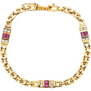 BRACELET WITH RUBIES AND DIAMONDS IN 14K YELLOW GOLD with 6 rectangular cut rubies ~0.84 ct and 12 brilliant cut diamonds ~0.60 ct