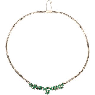 CHOKER WITH EMERALDS AND DIAMONDS IN PALLADIUM SILVER with 31 emeralds ~4.65 ct and 40 brilliant cut diamonds ~2.0 ct. Peso: 41.5 g