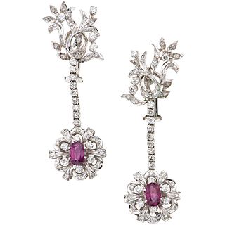 PAIR OF EARRINGS WITH RUBIES AND DIAMONDS IN PALLADIUM SILVER with 2 oval cut rubies~1.20 ct and 90 brilliant and 8x8 cut diamonds~1.30ct