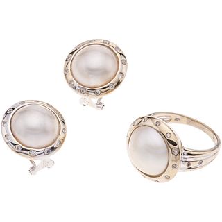 SET OF RING AND PAIR OF EARRINGS WITH HALF PEARLS AND DIAMONDS IN 14K WHITE GOLD with 40 brilliant cut diamonds 0.40 ct Weight: 12.6g