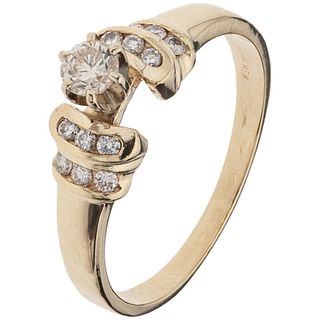 RING WITH DIAMONDS IN 14K YELLOW GOLD with 13 brilliant cut diamonds ~0.27 ct Weight: 2.3 g. Size: 6 ¼
