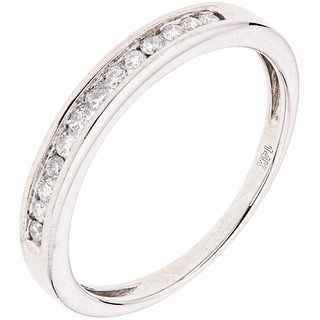 HALF ETERNITY RING WITH DIAMONDS IN 14K WHITE GOLD with 13 brilliant cut diamonds ~0.26 ct. Weight: 2.6 g. Size: 9
