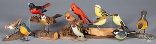 Group of carved and painted birds
