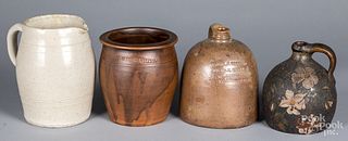 Four pieces of redware and stoneware, 19th c.