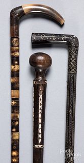 Three assorted canes/walking sticks, ca. 1900