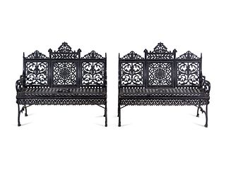 A Pair of American Gothic Revival Painted Cast Iron Garden Benches