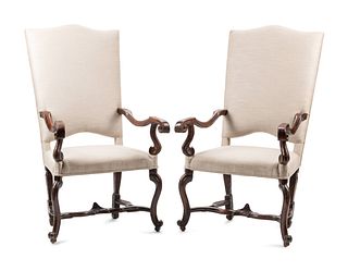 A Pair of Regence Carved Walnut Fauteuils