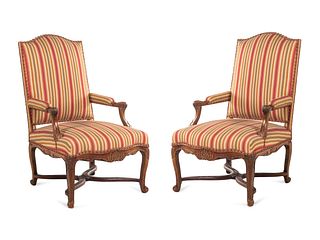 A Pair of Regence Carved Walnut Armchairs