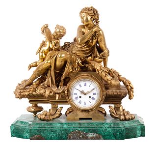 A Louis XV Style Gilt Metal Mounted Malachite Mantel Clock 