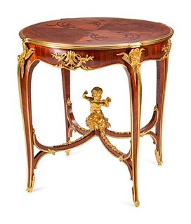 A Louis XV Style Gilt Bronze Mounted Marquetry Table
