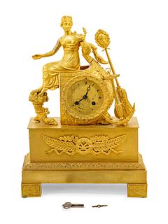 An Empire Gilt Bronze Figural Mantel Clock