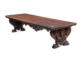 An Italian Renaissance Revival Carved Walnut Refectory Table