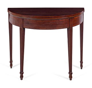 A Continental Mahogany Demilune Game Table