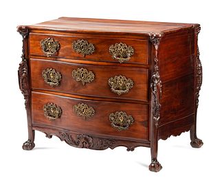 A Portuguese Carved Walnut Commode