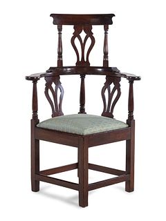 A George III Mahogany High-Back Corner Chair