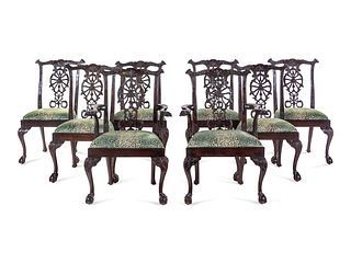 A Set of Eight George III Style Carved Mahogany Ribbon-Back Dining Chairs