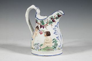 STAFFORDSHIRE PITCHER WITH PUTTI