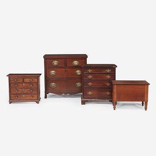 A group of four miniature chests of drawers 19th century