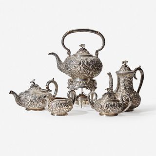 A "Baltimore Rose" five-piece sterling silver repouss&#233; tea and coffee service Baltimore Sterling Silver Co., Baltimore, MD, circa 1900