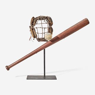 A baseball assemblage: early bat, catcher's mask, and practice ball late 19th to mid 20th century