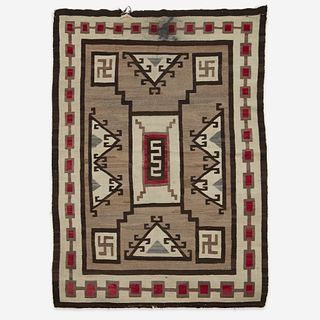 A Navajo rug Attributed to J.B. Moore, Crystal, New Mexico, early 20th century
