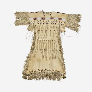 A Southern Plains beaded hide dress with tinklers 20th century