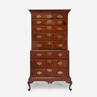 A Queen Anne figured maple chest-on-chest-on-frame New England, 18th century