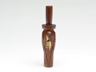 A rare and desirable carved and checkered duck call, John Jolly, Memphis, Tennessee.
