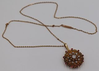 JEWELRY. 18kt Gold Diamond and Ruby Pendant.