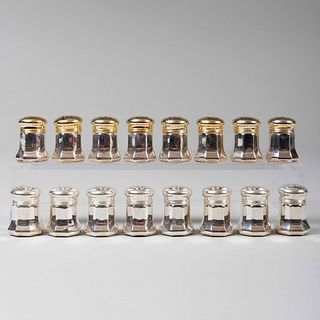 Two Sets of Eight Cartier Silver Casters