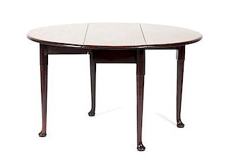 A Queen Anne Drop Leaf Mahogany Table Height 28 x width 17 (closed) x depth 42 inches.