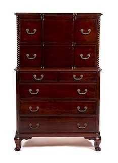 A Chippendale Style Mahogany Chest on Chest Height 56 x width 35 x depth 18 inches.