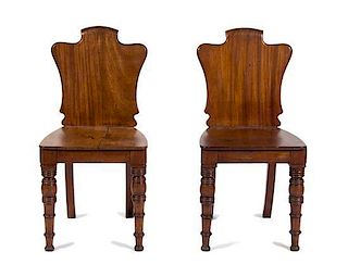 A Pair of William IV Style Mahogany Hall Chairs Height 33 inches.