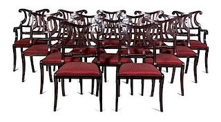 A Set of Fourteen Regency Style Mahogany Dining Chairs Height 38 inches.