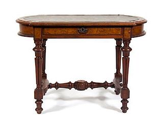 A Victorian Burlwood Occasional Table Height 28 1/4 x width 42 1/2 x depth 24 1/4 inches.