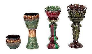 Three Majolica Jardinieres on Associated Stands Height of taller 24 inches.