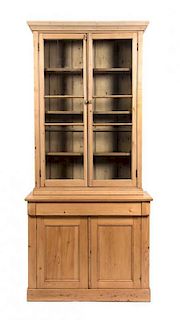 An Irish Pine Bookcase Height 77 x width 35 1/2 x depth 18 1/2 inches.