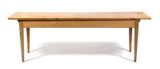 An Irish Pine Table Height 29 1/2 x width 88 1/4 x depth 25 1/4 inches.