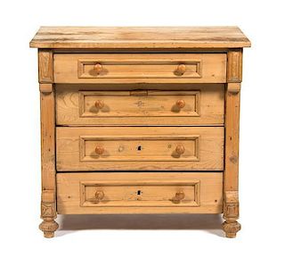 An Irish Pine Low Chest of Drawers Height 31 1/4 x width 33 1/2 x depth 21 1/8 inches.
