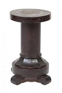 A Wood Low Pedestal Height 20 inches.