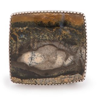 Gail Bird & Yazzie Johnson
(Dine, b. 1949 & 1946)
Silver and Petrified Wood Belt Buckle, with Deer and Raindrop Design on Reverse