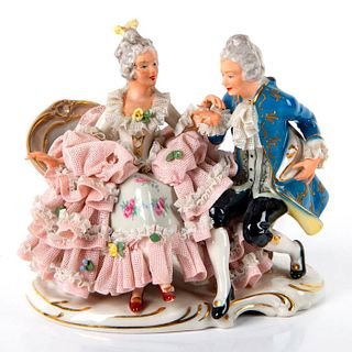 Dresden Porcelain Figurine of Man and Woman on Chaise Longue