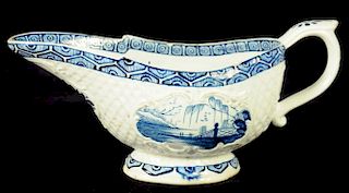A DERBY LATTICE MOULDED SAUCE BOAT, C1765-68 printed and painted in underglaze blue with