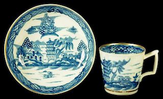 A CAUGHLEY COFFEE CUP AND SAUCER, C1790-95  painted in underglaze blue with the Tower pattern,