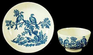 A CAUGHLEY TEA BOWL AND SAUCER, C1778-92  transfer printed in underglaze blue with the Birds in