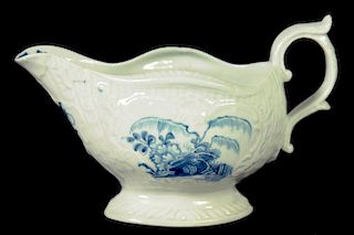 A LIVERPOOL MOULDED SAUCE BOAT, PHILIP CHRISTIAN & CO, C1768-78  painted in underglaze blue with
